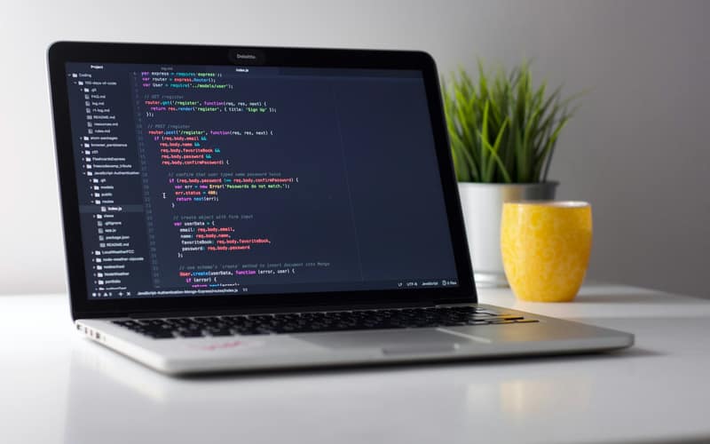 Source code open in an editor on a laptop